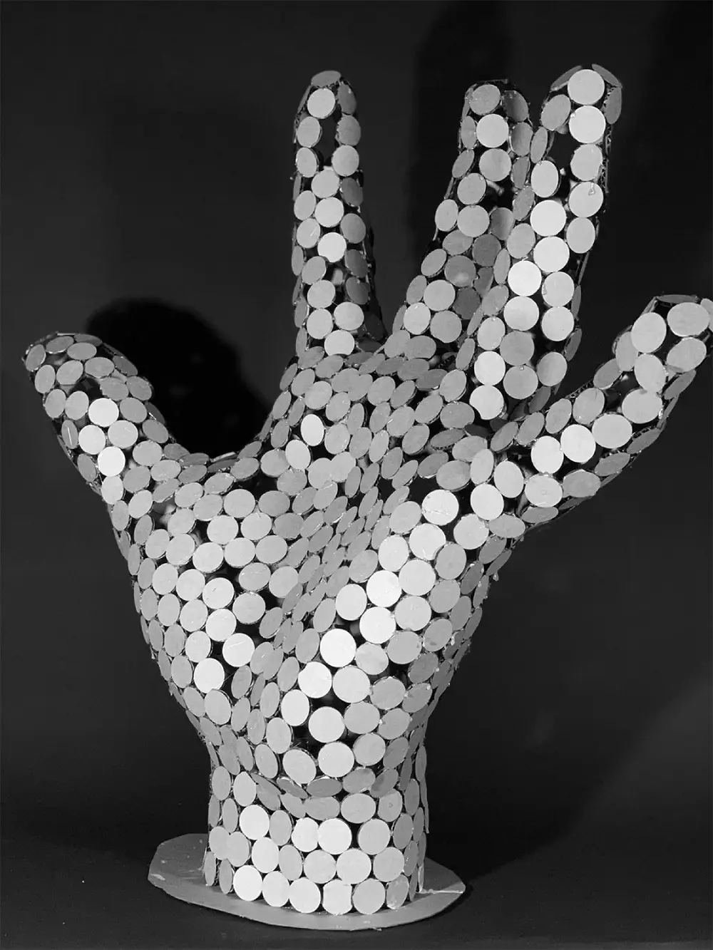 Cooperative Robotics Assembly; Finished shot of the hand, made out of cardboard circles. Jonathan Malott, Austin Texas Architecture